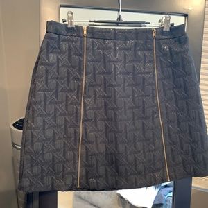 Black sparkly mini skirt.